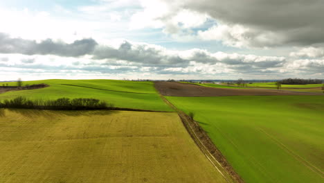 Aerial-View-Of-Serene-Rolling-green-hills-in-rural-landscape