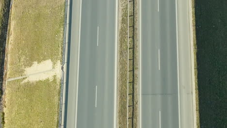 Top-view-of-car-and-vehicle-traffic-on-the-motorway-in-Gdynia,-Sweden
