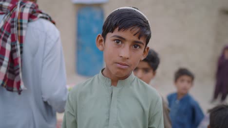 Profile-view-of-small-Pakistani-boy-in-Balochistan,-Pakistan