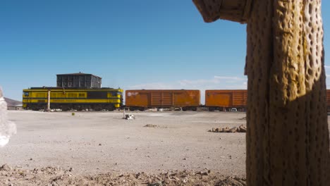 Freight-Train-Traveling-Through-The-Julaca’s-Ancient-Train-Station-In-Potosi,-Bolivia