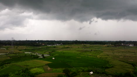 Dark-Stormy-Clouds-Above-Paddy-Fields-During-Rainy-Season-In-Bali,-Indonesia
