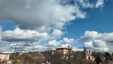 Clouds-Time-Laps-With-City-Landscape-In-Background