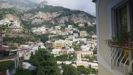 Grand-View-of-Positano-Amalfi-Coast-from-Balcony-|-Near-Scenic-Mountain-Cliffside-In-Positano-Italy-in-Summer,-4K