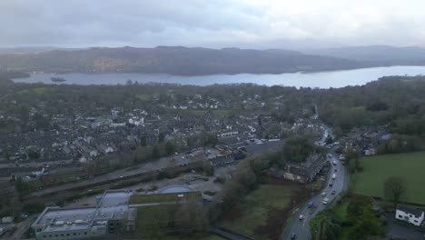Aerial-View-Of-Lake-Windermere-Shoreline-With-Hotels-And-Lodges-In-Lake-District,-England
