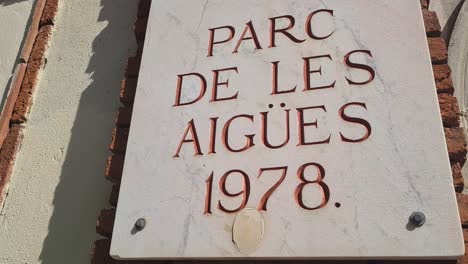 Parc-de-Les-Aigues-Sign-Board-at-Entrance,-Barcelona,-Spain,-Close-Up