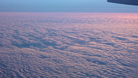 Beautiful-Cloudscape-in-the-evening-from-an-airplane-window-18000-ft-above-the-earth