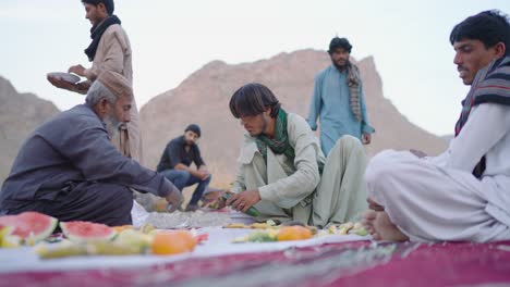 Locals-Preparing-Food-For-Ramadan-Iftar-Outside-In-Khuzdar,-Balochistan