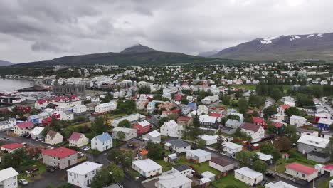 Aerial-View-of-Akureyri,-Iceland,-Cityscape,-Town-Buildings-and-Streets