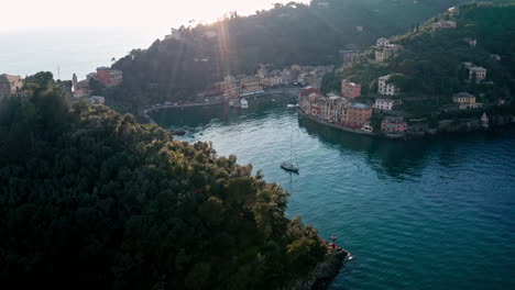 Harbor-and-colorful-houses-of-touristic-Portofino-on-Italian-Riviera,-aerial