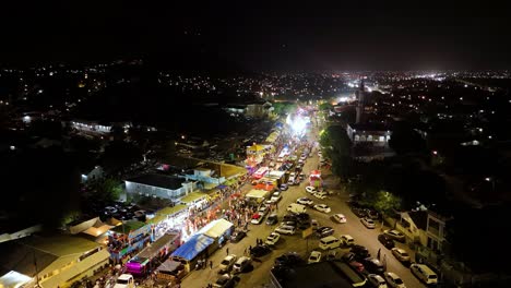 Gran-Marcha-promenade-parade-at-night-drives-down-empty-streets-in-Curacao