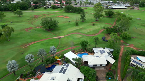 Aerial-Drone-of-Houses-On-Golf-Course-in-Marrara-Darwin-NT-Australia,-Pullback