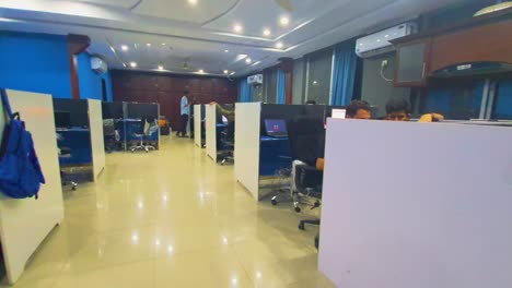 Call-center-view-with-staff-working-in-their-normal-routine