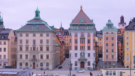 Telephoto-aerial-tracking-view-of-ancient-medieval-buildings-of-Gamla-Stan