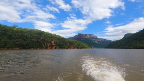 Scenic-view-with-forest-hills-from-boat-ride-at-Blyde-River-Canyon,-South-Africa