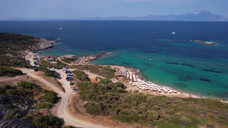 Aerial-View-of-Greek-Coastline,-Beach-and-Aegean-Sea,-Drone-Shot