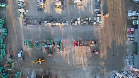 Overhead-drone-aerial-footage-of-industrial,-commercial,-yard