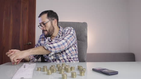 Happy-saver-man-counts-coins-celebrates-euphoric-with-his-hands