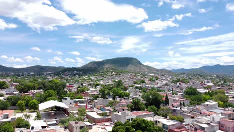 An-aerial-journey-towards-the-Yucunitza-mountain-in-Huajuapan-de-Leon,-Oaxaca,-Mexico