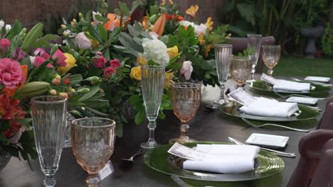 Crystal-glasses-placed-on-the-wedding-banquet-table-along-with-elegant-tableware