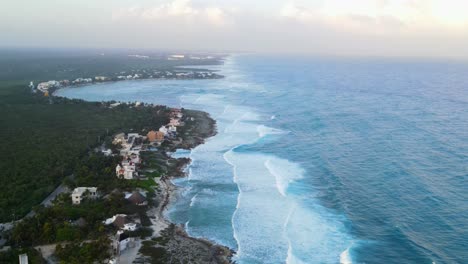 The-incredible-view-of-one-of-the-beaches-of-the-Riviera-Maya-with-waves-breaks-on-a-coastline