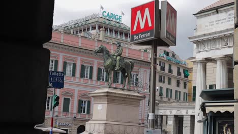 Metro-station-De-Ferarri-and-monument-in-the-background-in-Genoa-Italy