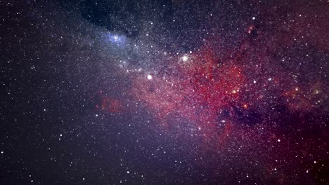 Space-travel-background-among-the-luminous-stars-with-red-background
