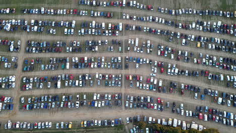 Linear-Side-Overhead-Busy-Parking-Lot-Filled-With-Parked-Cars