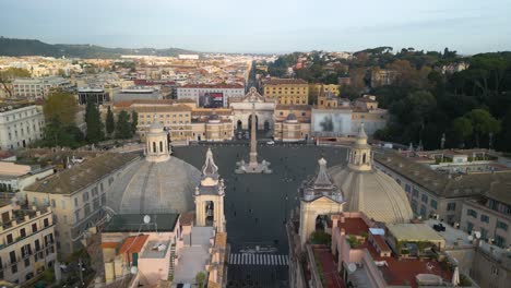Aerial-Pullback-Away-from-Piazza-del-Popolo,-Reveals-Domes-of-Two-Twin-Churches