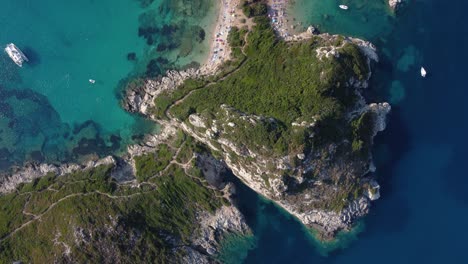 Top-View-of-Overcrowded-Porto-Timone-Beach,-Corfu-Island,-Greece