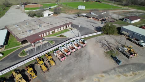 This-is-aerial-footage-of-various-businesses-on-the-west-side-of-the-city-of-DeLeon-in-Texas