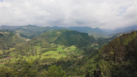 Aerial-Panoramic-view-of-Cocora-valley,-Lush-Landscape-from-Salento-on-Cloudy-Day,-Colombia