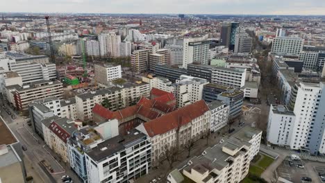 Aerial-drone-view-of-Berlin,-Germany-on-a-cloudy-day
