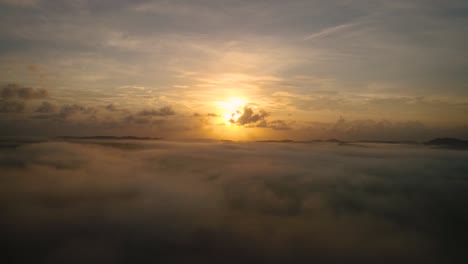 Left-to-right-aerial-view-of-the-sunrise-about-low-cloud