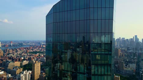 Glass-panels-all-around-modern-building,-Madison-Square-Park,-New-York