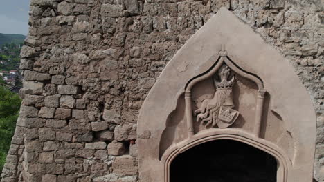 Wall-of-the-fortress-Jajce-in-Bosnia-and-Herzegovina-with-a-family-crest