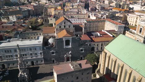 Orbiting-Drone-Shot-Above-Church-of-Gesu-Nuovo,-Naples,-Italy