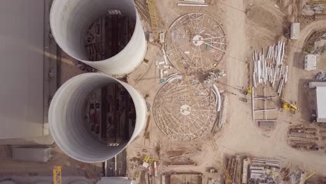 Aerial-top-view-of-silos-in-mid-construction-phase