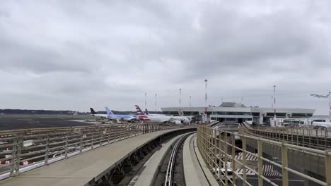 Modern-skybridge-monorail-train-people-mover-from-main-terminal-to-satellite-terminal-at-Rome-Fiumicino-airport