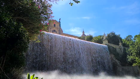 Slow-Motion,-Waterfall-Cascade-on-Montjuic,-Barcelona,-Spain-on-Hot-Sunny-Summer-Day