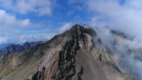 Aerial-drone-shot-of-majestic-rocky-mountain-peak