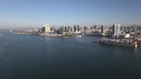 Aerial-of-Downtown-San-Diego-skyline-over-Coronado-Bay-during-clear-blue-day