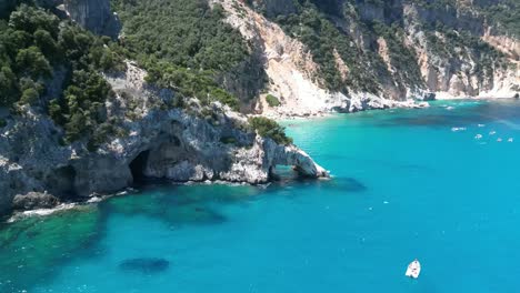Cala-Goloritze-and-Nautical-Tourism-along-Italian-Coastline-in-Sardinia,-Aerial