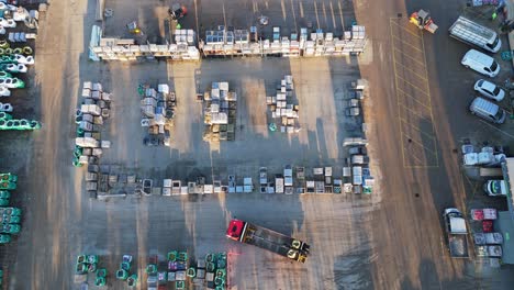 Overhead-drone-aerial-footage-of-industrial,-commercial,-yard