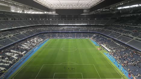 left-to-right-pan-establishing-shot-of-Real-Madrid-stadium-during-football-soccer-corazon-classic-match-Real-Madrid-legends-vs-Oporto-vintage-in-march-2024-during-match-break