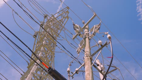 Low-angle-view-looking-up-at-power-lines