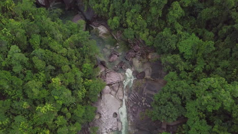 The-Babinda-Boulders-in-Cairns,-Australia-boast-swift-creeks-and-dense-forests-intertwining-with-massive-granite-formations,-reflecting-the-tranquil-beauty-that-inspired-its-name