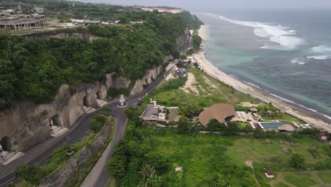 Aerial-view,-Pandawa-beach-Bali-which-is-a-popular-beach-on-the-Indonesian-island-of-Bali-with-its-typical-limestone