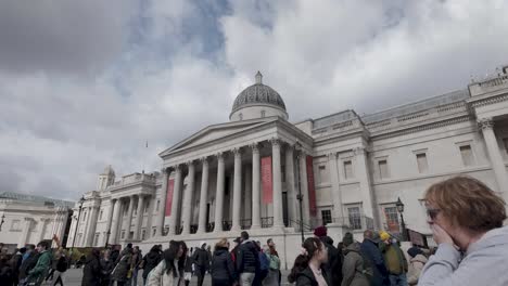 People-At-Trafalgar-Square-Outside-The-National-Gallery-In-Westminster,-London,-UK