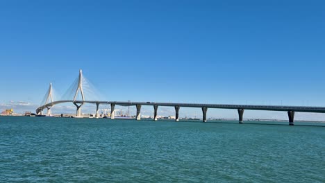 Cadiz-Bay-Bridge-on-a-Sunny-Day-with-Cars-Passing-by,-Spain
