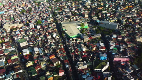 Aerial-view-around-the-Puregold-supermarket,-in-sunny-Makati,-Philippines